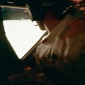 AS11-37-5532