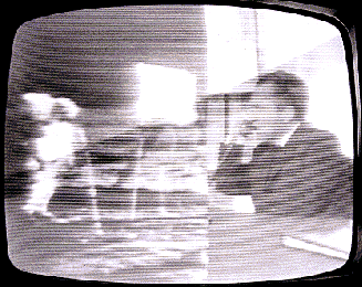 Split television screen showing President Nixon speaking to Apollo 11 astronauts
