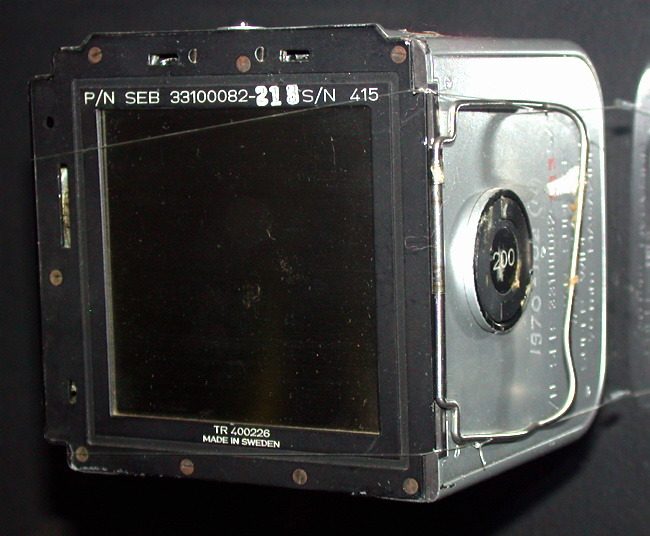 Front and lefthand
surfaces of the Apollo 11 Hasselblad magazine showing the
large wire dark-slide handle designed for use with gloves